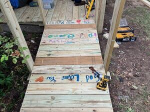 Leo's new ramp, built with boards inscribed with messages from kids. 